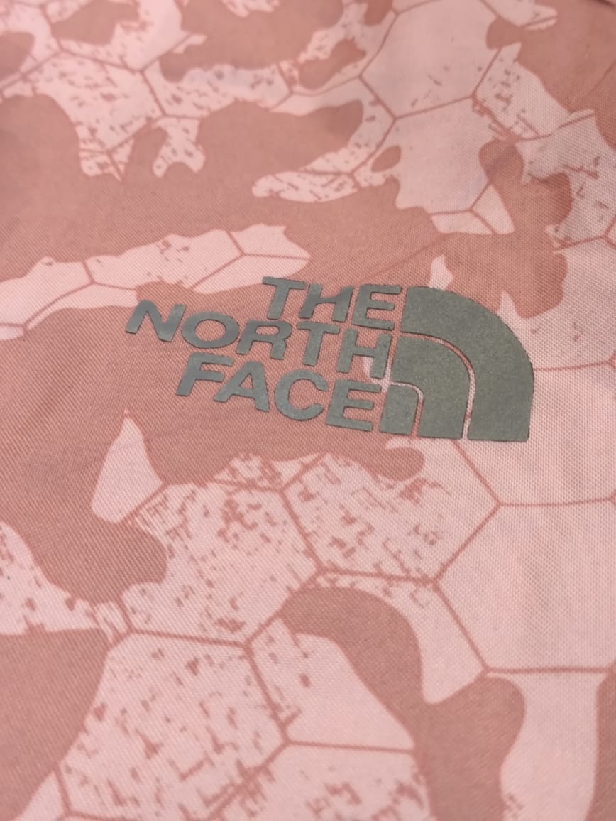 Rompevientos jaspeada THE NORTH FACE